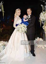 Girls next door reality star holly madison, 33, is officially a married woman, people reports. Holly Madison Rainbow Rotella And Pasquale Rotella Pose For Photos Celebrity Wedding Dresses Wedding Dresses Unique Celebrity Weddings