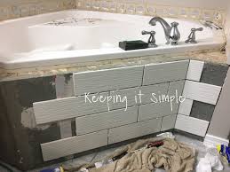 Marble is a beautiful stone that's often used in bathroom design. Tips On How To Tile A Corner Bathtub Using Wavecrest And Venatino Linear Mosaic Tiles Keeping It Simple