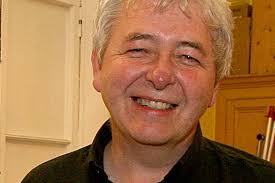 Last round of applause as musician Eamon Friel laid to rest