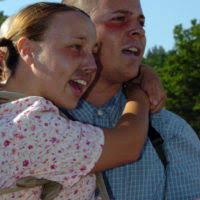 PETTY Officer 2nd Class Mike Booker and his wife, Ann, enjoy a homecoming  party at the Bethesda Naval Medical Center. The celebration is being held  in honor of the crew members of