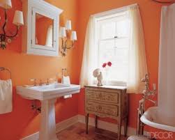 A big variety of colorful bathroom decorating ideas depending on bright colors for the walls, floors, and accessories. Orange Bathroom Decorating Ideas