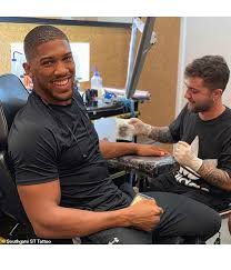 06/01/2019 comments off on anthony joshua tattoo: Anthony Joshua Gets A Lion Tattooed On His Middle Finger Max102 3 Fm