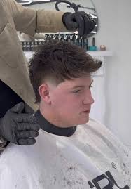 Nathan Cutting His Own Hair