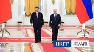 China's Xi tells Russia's Putin ready to 'expand' cooperation