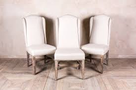 Cream Studded Dining Chair Upholstered In Neutral Linen Oak Chairs Upholstered Chairs Oak Chair Dining Chairs