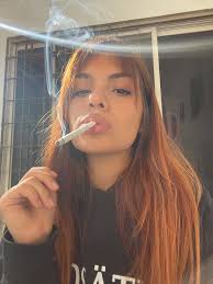 Melanie is a woman who has a smoking fetish.