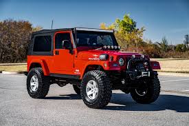 Image result for Flame Red 2006 Jeep