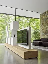 15 Idee Di Porta Tv Moderne Ed Eleganti Per Picco In 2020 Moderne Raumteiler Wohnzimmer Tv Wand Ideen Tv Mobel Freistehend