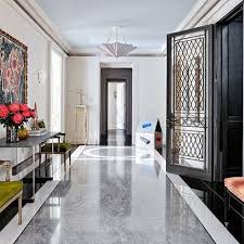 Michael S Smith And Oscar Shamamian Devised This Family Friendly Home In Manhattan Home Tiles Design Luxury Marble Flooring Foyer Flooring