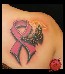 Because the word 'strength' is inked in white, the hot pink of the ribbon really pops, making it the focal point of this piece. Beautiful Cancer Ribbon Butterfly Tattoo