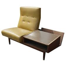 mid century naugahyde chair with side magazine rack table via mid century moder mid century modern lounge chairs mid century chair mid century furnishings