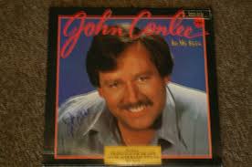 Sold at Auction: JOHN CONLEE AUTOGRAPHED ALBUM