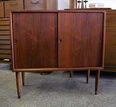 Kitchen cabinetry is probably one of the most used features of your home. Mid Century Modern Danish Teak Cabinet With Sliding Doors