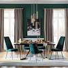 Make a big statement with an emerald green living room. 3