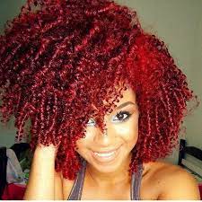 Her bangs come to her eyes, just barely framing them with parts of longer, thick hair that go past her shoulders and reach her chest. Hello Red Black Hair Information Community Natural Hair Styles Natural Hair Color Colored Hair Tips