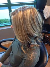 Wear gloves to protect your hands, and use a hair coloring brush to apply the dye. Choppy Blonde Hair With Burgundy Underneath The Bangs Brown Hair Underneath Blonde Hair With Highlights Brown Hair With Blonde Highlights