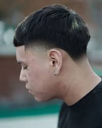 While the low cut still offers the traditional short sides and back, the tapered haircut doesn't expose too. Temp Fade Haircut