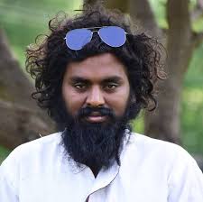 Kranthi Kumar Panikera DrillMan stopped 57 electric fan blades using his  tongue in just one minute 🤯