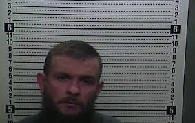 Harlan County murder under investigation, 2 arrested