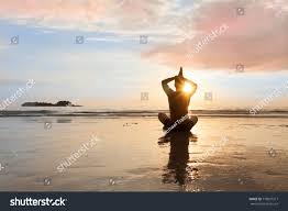 Zen Like Idyllic Scene Young Man Meditating On Sunset Sea Beach In Lotus Pose He Reflects In Wet Sand Idyllic Meditation Sunset Sea