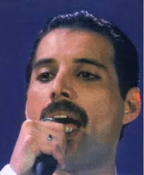 Freddie performing, 'Is This The World We Created?!' After Queen's iconic  20 Minute performance, Freddie and Brian graced the stage again to perform  this poignant song 🎶 🎶