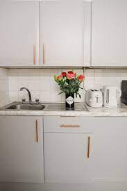 I only needed one coat. How To Paint Laminate Mdf Kitchen Cabinets Dainty Dress Diaries