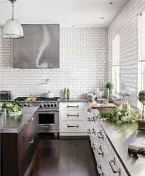 10 Stylish Kitchens With Stainless Steel Countertops Stylish Kitchen Best Kitchen Countertops Kitchen Design