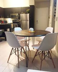 Finch alfred round solid wood rustic dining table for farmhouse kitchen room decor, wooden trestle pedestal base, 47 wide circular tabletop, distressed beige. 42 Round Industrial Chic Kitchen Table With Handcrafted Wood Top And Steel Hairpin Legs Modern Din Modern Kitchen Tables Round Dining Table Diy Kitchen Table