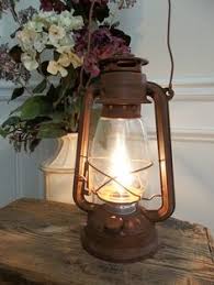 20 Best Electric Lantern Lighting Images Lantern Lamp Wall Fixtures Wagon Wheel Chandelier