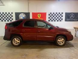 Image result for Red Brown 2004 Pontiac