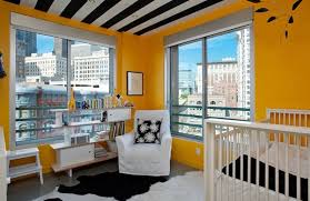 Striped walls and rug look great together. How To Decorate Your Baby S Gender Neutral Nursery