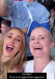 WAGS at AFL grand final: Nathan Buckley's partner Brodie Ryan and Chris  Judd's wife Bec celebrate Pies' win