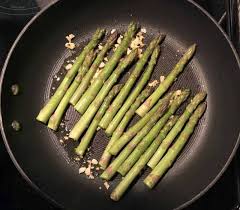 Heat up the oil in a frying pan/skillet. Pan Seared Asparagus With Soy Sauce And Garlic Recipe