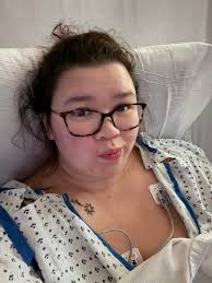 48 hours post-op, experiencing headache and fatigue