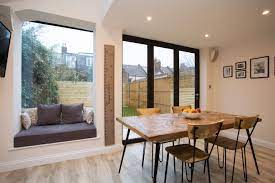 Mar 29, 2019 · whether you're looking for a modern mural, a classic repeating pattern, or an abstract print, you'll find something to elevate every dinner party with our eighteen dining room wallpaper ideas. Nice Way Of Squeezing A Sofa Seating Area Into A Smaller Kitchen Diner Extension Open Plan Kitchen Dining Kitchen Diner Decor Kitchen Diner Extension