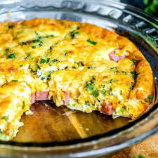 Low Carb Ham And Cheese Crustless Quiche With Shredded Sharp Cheddar Cheese Eggs Heavy Cream Ham Low Carb Quiche Quiche Recipes Low Carb Breakfast Recipes