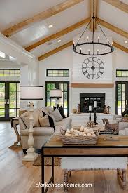 Shiplap Wraps The Fireplace And Carries Up To The Vaulted Ceiling That Also Features Na Vaulted Living Rooms Vaulted Ceiling Living Room Farm House Living Room