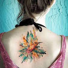 Why You Want To Get A Hummingbird Tattoo Inkdoneright Tattoos Hummingbird Tattoo Birds Tattoo