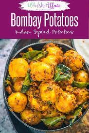 Bombay Potatoes Is A Popular Dish Made Using Baby Potatoes And Indian Masalas Popula Bombay Potato Recipe Indian Potato Recipes Indian Food Recipes Vegetarian