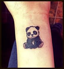 Small Panda Tattoo On Wrist Panda Tattoo Tattoos Tattoos With Meaning