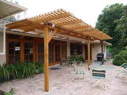 All deck and patio covers insulated patio covers retractable patio covers steel carports flat stronger design the vienna trellis is made with advaced high grade polymers, so it won't crack, split. Timbersil Glass Wood Patio Trellis Pacific Palisades Ca Patio Trellis Budget Patio Patio Design