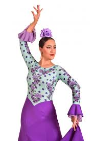 The spanish flamenco dancer cecilia gómez is delighted wearing some of the party dresses from the new rosa clará cocktail collection, in a special report from the magazine ¡hola !. Robe Flamenco Moraito Pastori