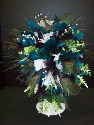 Pin By A C Moore Arts Crafts On Moore Floral Arranging Unique Wedding Centerpieces Feather Centerpiece Wedding Feather Centerpieces