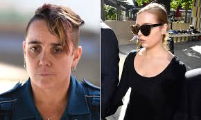 Woman cleared for punching Queensland paramedic