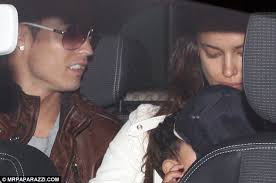 For her outing, irina showed off her long legs in a little, black dress paired with a bright green jacket and combat boots while staying safe in a face mask. Cristiano Ronaldo Takes Charge Of His Baby Son And Girlfriend Irina Shayk Gets A Cuddle Too Daily Mail Online