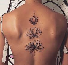 The thick petals contrast against the thin stem, emphasizing the femininity of the tattoo as well. Lotus Flower Tattoo Design Ideas Body Tattoo Art