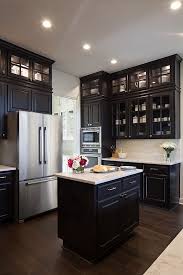 Refreshing A Home With New Furniture And Decor Home Bunch Interior Design Ideas Black Kitchen Cabinets Interior Design Kitchen Glass Fronted Kitchen Cabinets