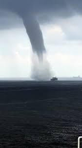 Singapore's gloomy rainy season has gone from forming doomsday clouds and blazing lightning bolts to yet another occasional sighting — a waterspout. Waterspout Passes Over Ship In Singapore Video Dailymotion