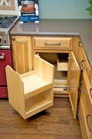 The lazy susan is probably the oldest trick in the book and most interior designers go with this idea. Corner Kitchen Cabinet Corner Storage Cabinet Blind Corner Cabinet