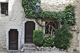 Tortueuse Maison Wooden Doors Stone Wall House